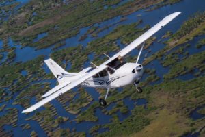 Cessna 172 flying aerial shot
