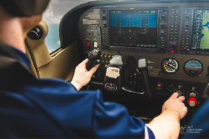Cessna 172 g1000 avionics cockpit of a male student pilot flying